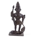 A bronze figure of Durga slaying the buffalo demon, Deccan 19th century or earlier, height 13cm