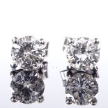 A pair of 18ct white gold 1ct solitaire diamond earrings, each diamond approx 0.5ct, stud