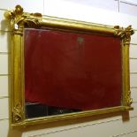 A 19th century carved giltwood framed overmantle mirror with acanthus pediment, width excluding leaf