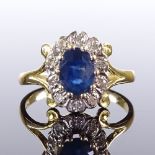 An 18ct gold sapphire and diamond cluster dress ring, setting height 12mm, size M, 2.9g Very good