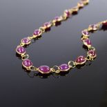 An unmarked gold cabochon ruby line necklace, necklace length 46cm, 5.6g Very good original