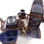 A Rolleiflex twin lens reflex camera, serial no. 1091300, leather-cased, and a Reflex-Korelle camera