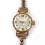 DATZWARD - a lady's Vintage 18ct gold Incabloc mechanical wristwatch, silvered dial with quarterly