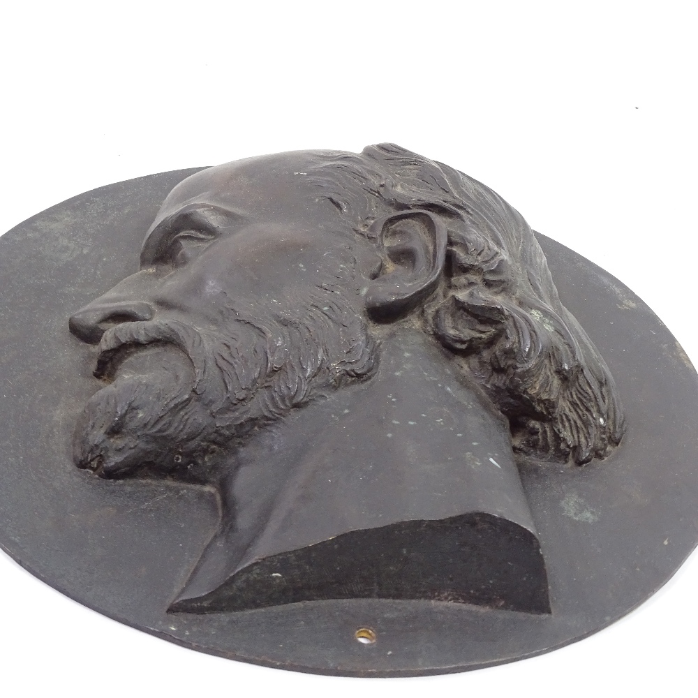 A 19th century patinated bronze relief plaque depicting the head of a man, unsigned, with Eck & - Image 2 of 4