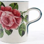 A large Wemyss Pottery tankard with hand painted rose design, impress marks, height 14cm One very