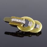 An Art Deco style 18ct yellow and white gold diamond dress clip brooch, pierced and stepped