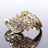 An 18ct gold diamond cluster crossover ring, total diamond content approx 0.5ct, setting height 10.