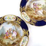 A pair of 19th century Sevres cabinet plates, hand-painted romancing couple central scenes with
