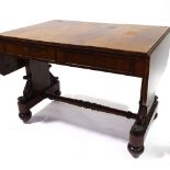 An early 19th century mahogany drop leaf sofa table, with 4 frieze drawers, carved end pillars and