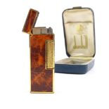 DUNHILL - a gold plated Rollagas cigarette lighter, flame lacquer decoration, length 6.5cm, boxed