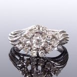 An American 14ct white gold diamond cluster eye ring, total diamond content approx 0.55ct,