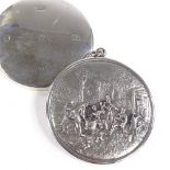 2 silver-mounted circular handbag mirrors, 1 with relief embossed country scene, diameter 7cm (2)