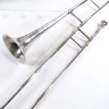 A trombone circa 1900 by A Hall Gisborne, serial no. 16583, with case