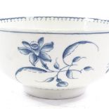 An 18th century Worcester blue and white porcelain bowl, with painted floral motifs, crescent