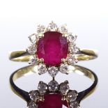 An 18ct gold ruby and diamond cluster ring, total diamond content approx 0.2ct, setting height 10.