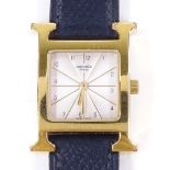 HERMES - a lady's gold plated stainless steel Heure H quartz wristwatch, ref. HH1.201, silvered