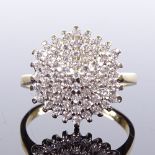 An 18ct diamond cluster dress ring, total diamond content approx 1ct, setting height 15.1mm, size M,