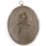 A 19th century Russian silver-mounted oval icon, mount stamped 84, height 13.5cm