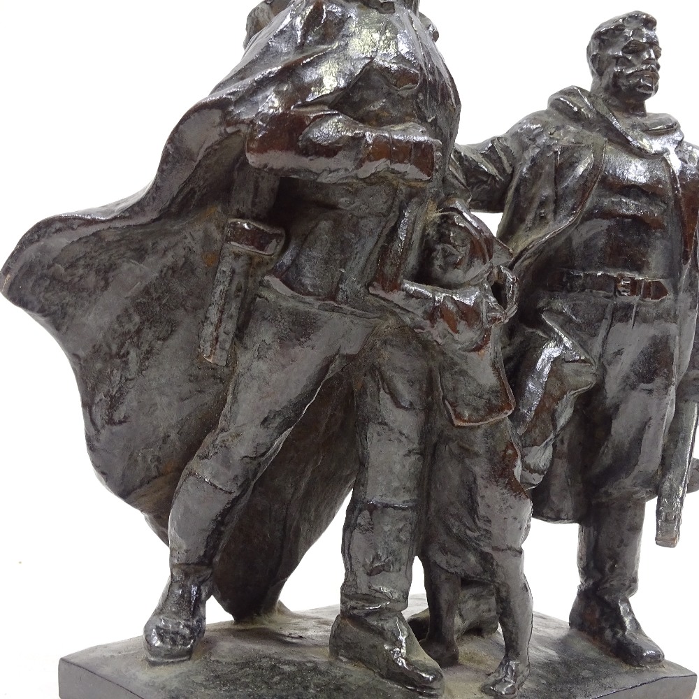 Mid-20th century Russian patinated bronze sculpture, 2 soldiers carrying machine guns with a young - Image 3 of 3