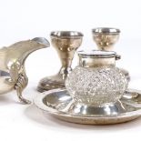 An Edwardian silver and cut-glass inkwell, a small silver sauce boat and a pair of silver-mounted