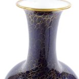 A Continental blue and gilt glaze porcelain narrow-necked vase, height 31cm