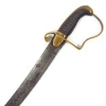 A George III sabre with curved blade and brass hilt with wood grips