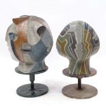 A pair of unusual painted clay sculptures, abstract head compositions, probably mid-20th century,