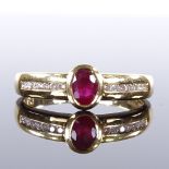 An 18ct gold ruby and diamond band ring, channel set diamond shoulders, setting height 6.2mm, size
