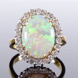 An 18ct gold cabochon opal and diamond cluster panel ring, total diamond content approx 0.6ct,