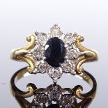 A 9ct gold sapphire and diamond cluster ring, open work underbridge, total diamond content approx