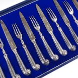 A 6 place silver pistol-grip fruit cutlery set, comprising forks and knives with silver blades, by