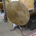 A 19th century circular mahogany tripod table, 2'10" across