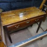 A George III mahogany side table of rectangular form, single frieze drawer, shaped apron, raised