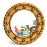 A gold painted circular wall mirror, diameter 30cm