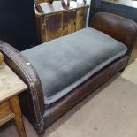 An early 20th century studded leather-upholstered daybed, L162cm, seat height 55cm, overall height