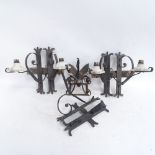 Wrought-iron wall light fittings, and a small hanging lamp