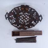 A Black Forest style carved and pierced wood basket, and a cased set of hardwood chopsticks (2)