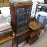 A narrow Edwardian mahogany display cabinet with drawers under, width 45cm