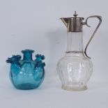 A cut-glass claret jug with silver plated mount, 27cm, and a 5-spouted glass vase