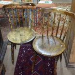A pair of Vintage elm penny seated stick-back kitchen chairs on turned legs