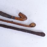 3 rootwood carved walking canes, largest length 94cm (3)