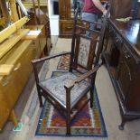 An Arts and Crafts high-back armchair by William Lethaby, with inlaid decoration