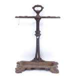 A Victorian painted cast-iron stick stand, with removable drip tray, height 70cm