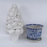 An Italian ceramic fruit pyramid, 60cm, and an Oriental blue and white jardiniere on saucer