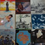 Various Vintage vinyl records and LPs, including Commodores, Stevie Wonder, and Steely Dan