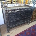 An Antique Korean marriage chest, with all over chip carved decoration, W110cm, H101cm, D59cm