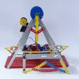 A modern Meccano fairground swinging ship, ship length 35cm