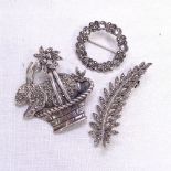 3 silver marcasite brooches, including rabbit in a basket, fern, and a Swedish floral roundel, 20.4g