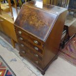 A late 19th century mahogany and satinwood-banded bureau of narrow size, with fitted interior, 4