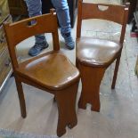 A pair of Arts and Crafts chairs attributed to Liberty & Co
